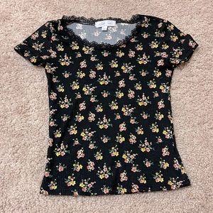 Tight shirt with flowers.